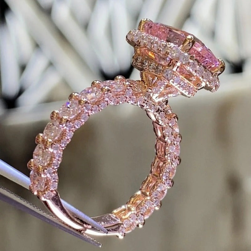 Elegant Pink Synthetic Zirconia Ring with Halo Setting & Rose Golden Plating