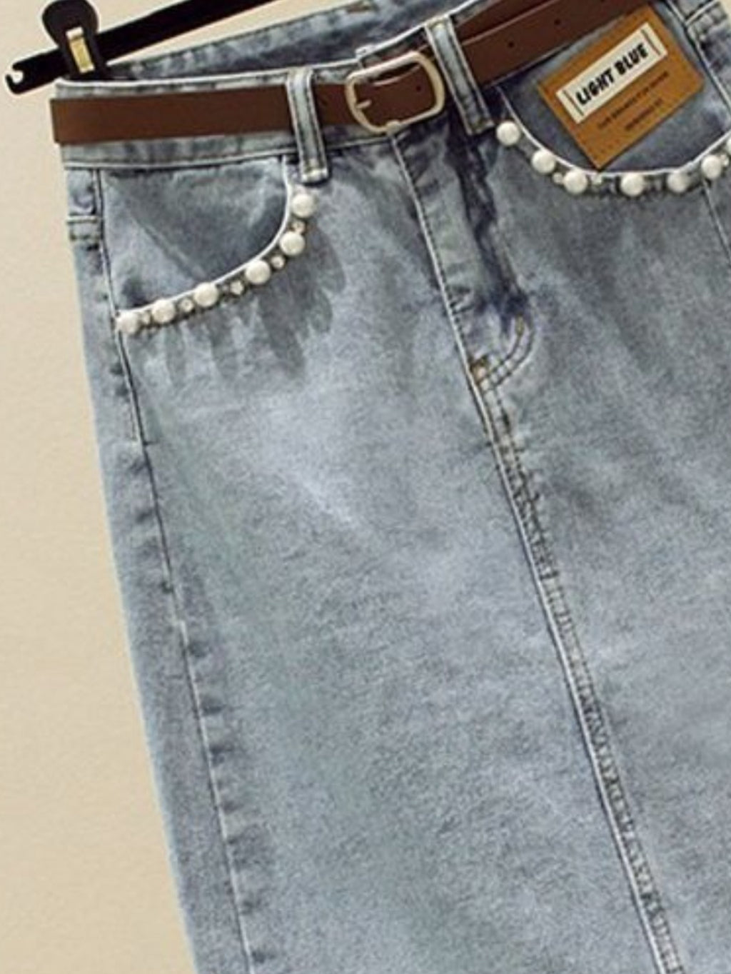 High-Waisted Slim-Fit Denim Skirt with Pearl-Trimmed Slit & Fringe Hem
