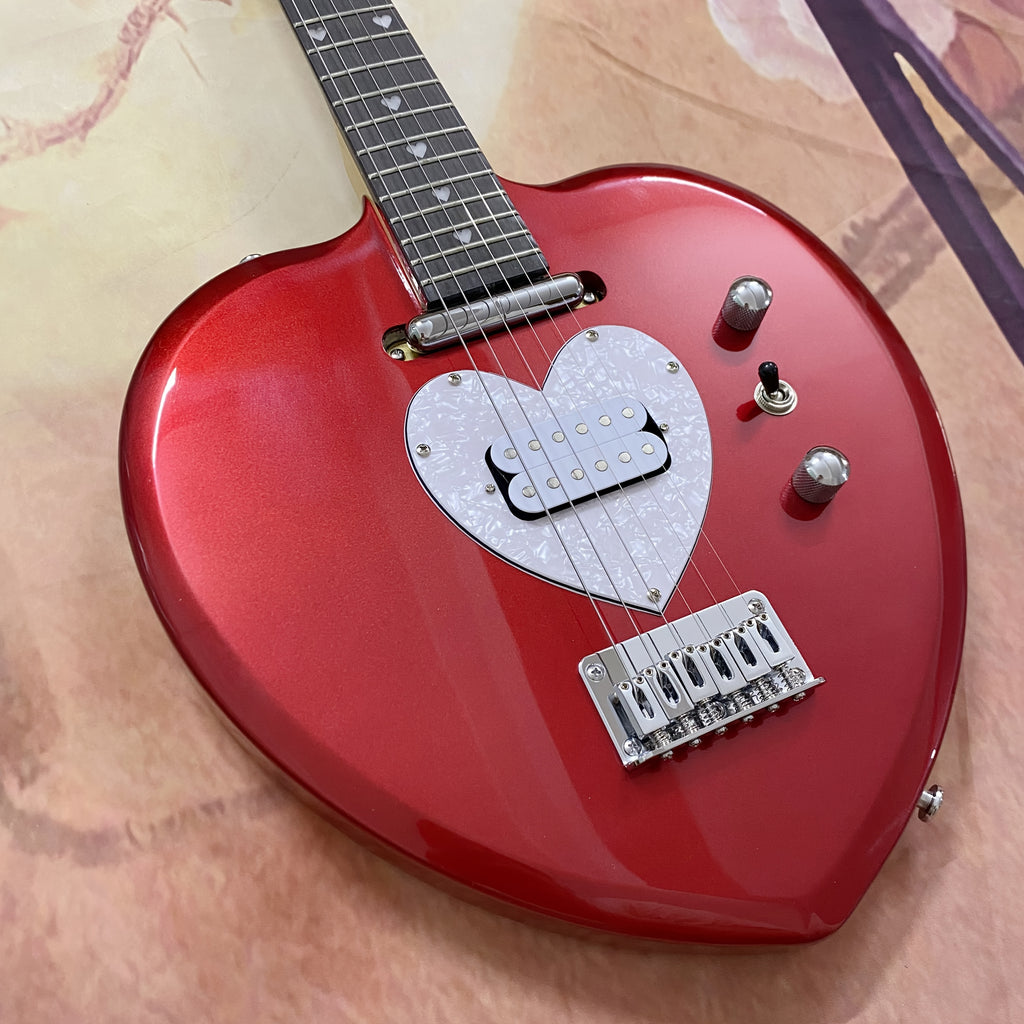 Red Electric Guitar with Heart Cutout Body & Glittering Pickguard