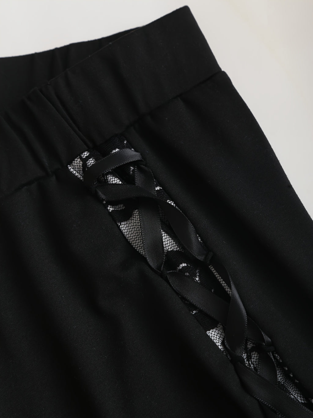 Women's Gothic Flared Pants with Contrast Lace and Tie-Up Design