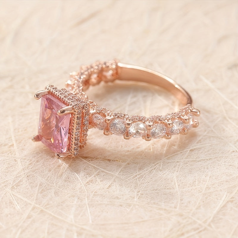 Elegant Pink Synthetic Zirconia Ring with Halo Setting & Rose Golden Plating