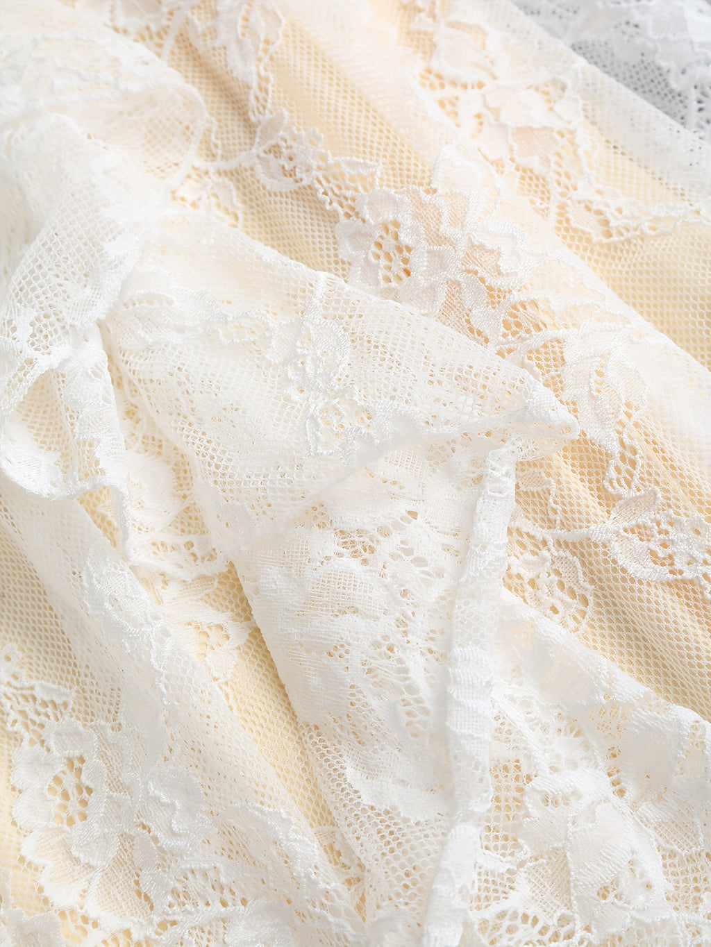 Elegant Off-Shoulder Lace Dress with Ruffle Detail and Bow Accent