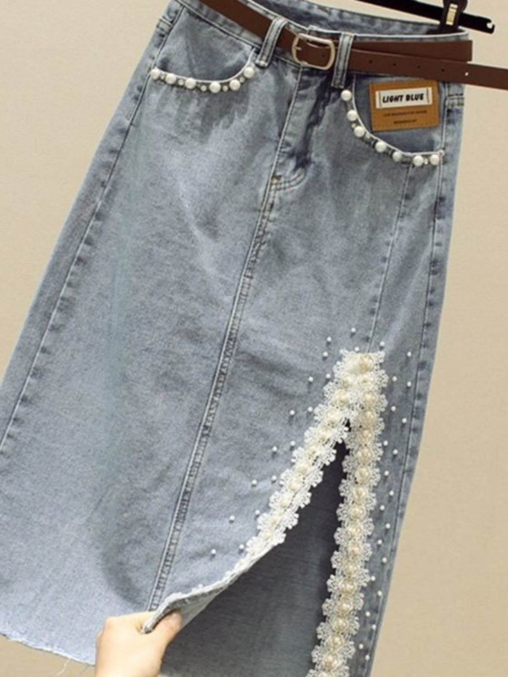 High-Waisted Slim-Fit Denim Skirt with Pearl-Trimmed Slit & Fringe Hem