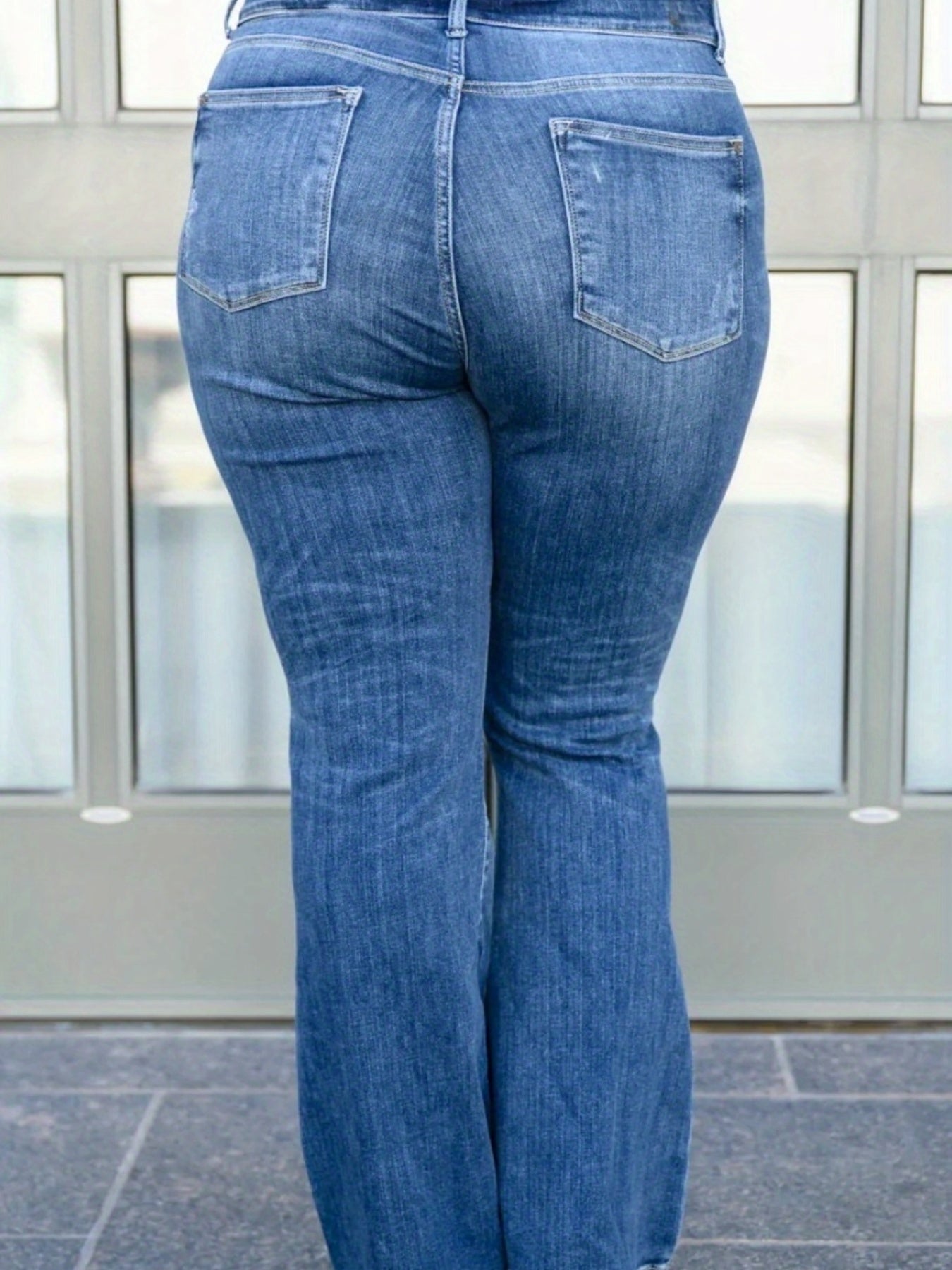 High-Waisted Ripped Bell-Bottom Jeans