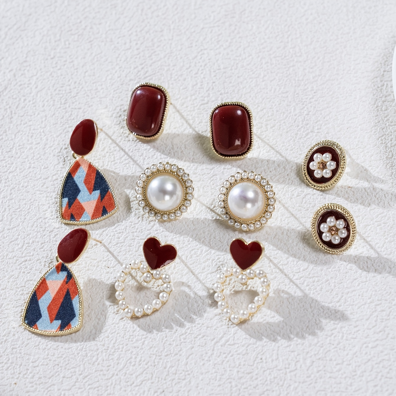 A Set of Five Pairs of Stylish Earrings in Wine Red