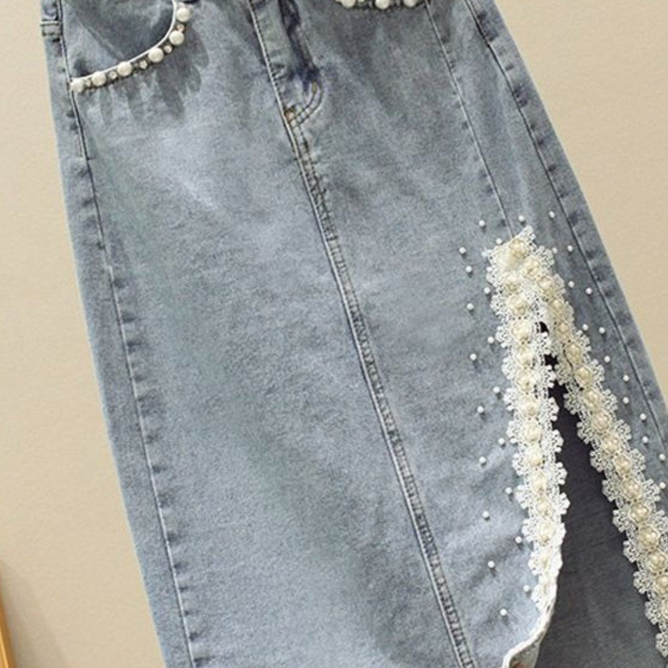 High-Waisted Slim-Fit Denim Skirt with Pearl-Trimmed Slit & Fringe Hem