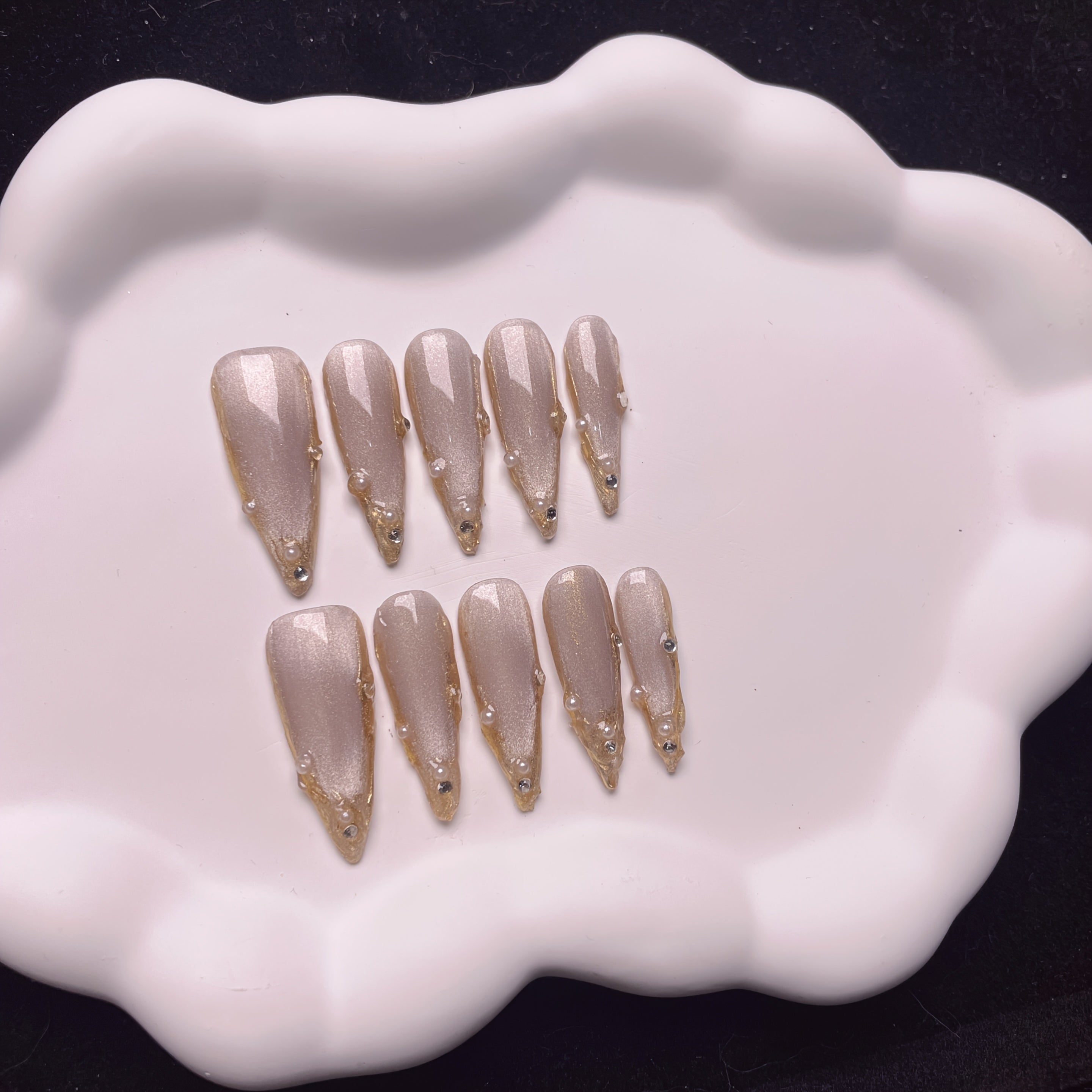 Set of 10 Handmade Press-On Nails Stiletto Shape in Champagne And Golden French Styles, Adorned with Luxurious Crystals And Shiny Pearls