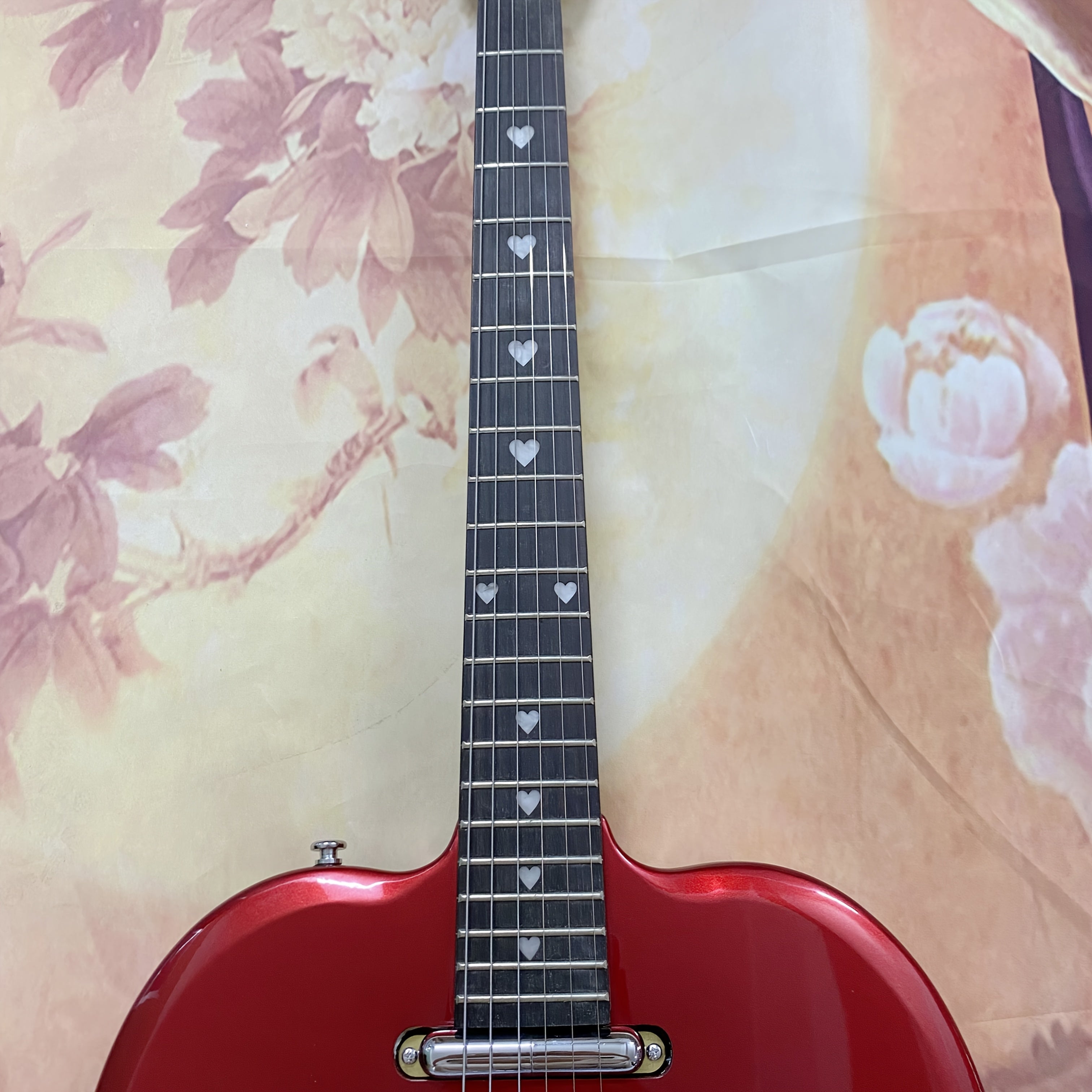 Red Electric Guitar with Heart Cutout Body & Glittering Pickguard