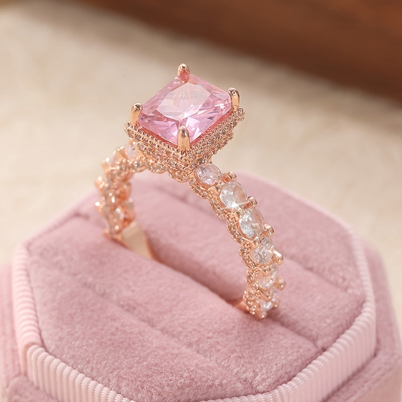 Elegant Pink Synthetic Zirconia Ring with Halo Setting & Rose Golden Plating