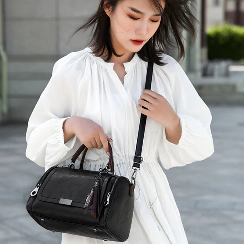 Textured Crossbody Satchel with Tassel Charm