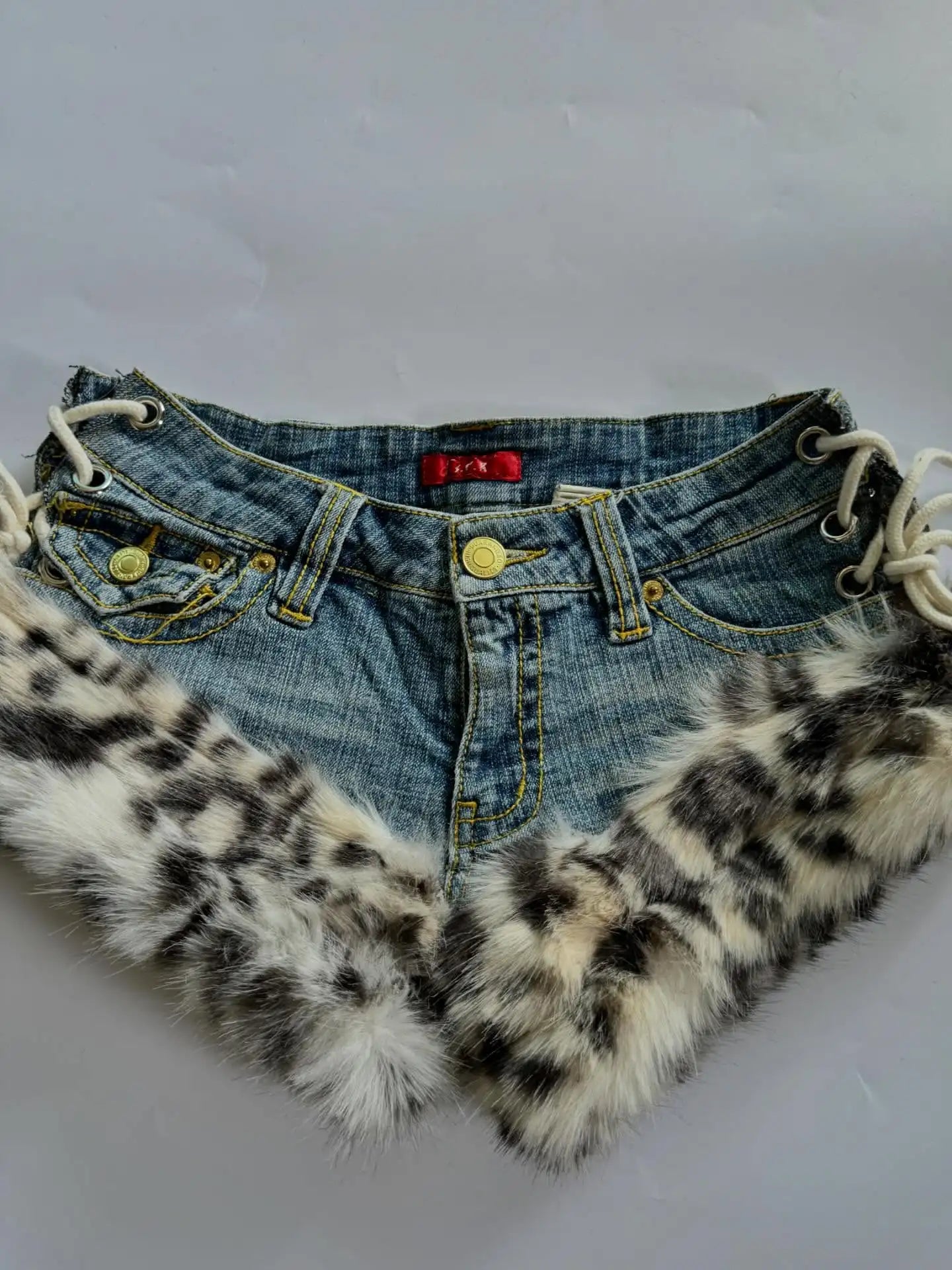 Leopard Print Raw Edge Denim Shorts