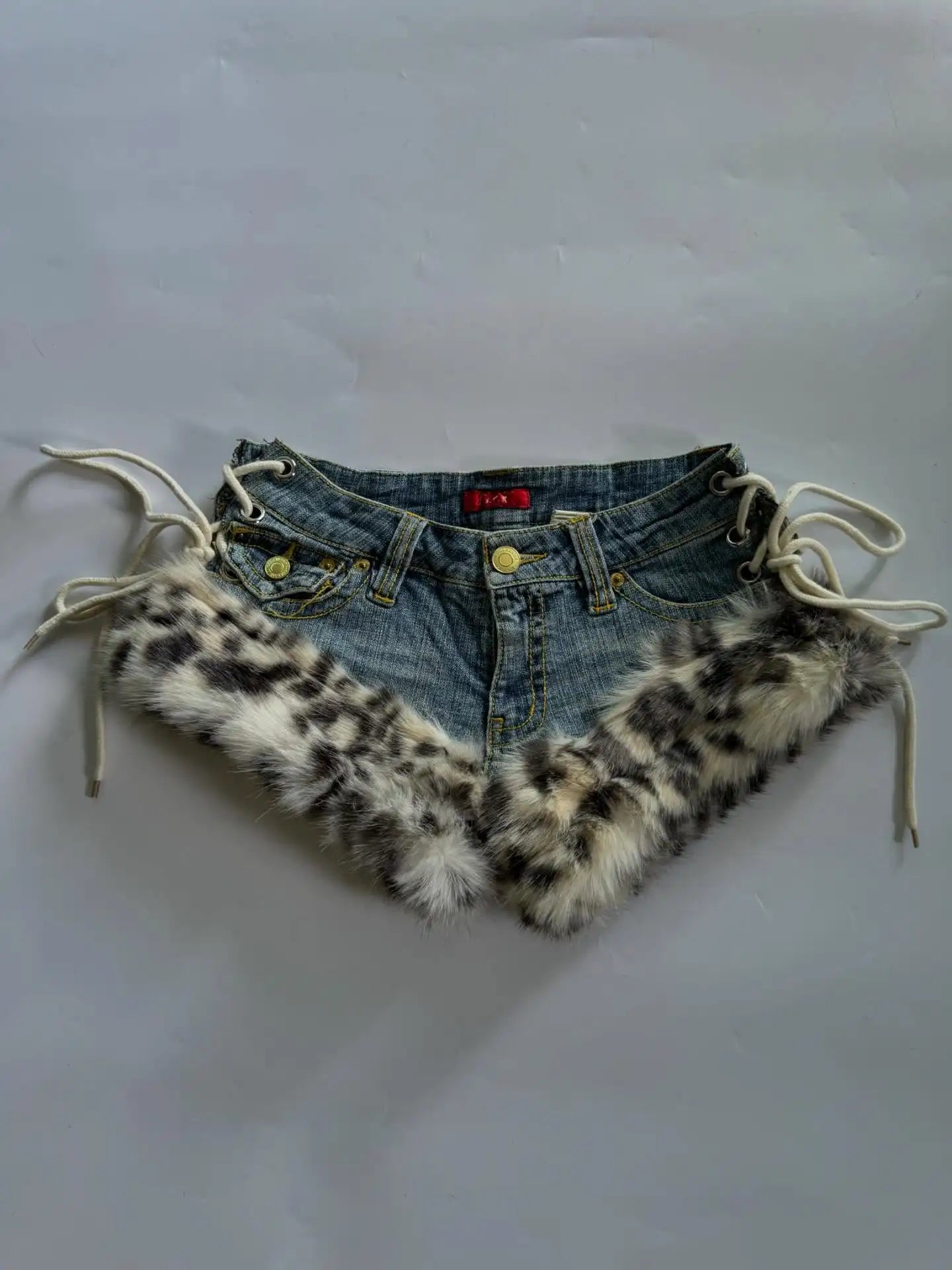 Leopard Print Raw Edge Denim Shorts