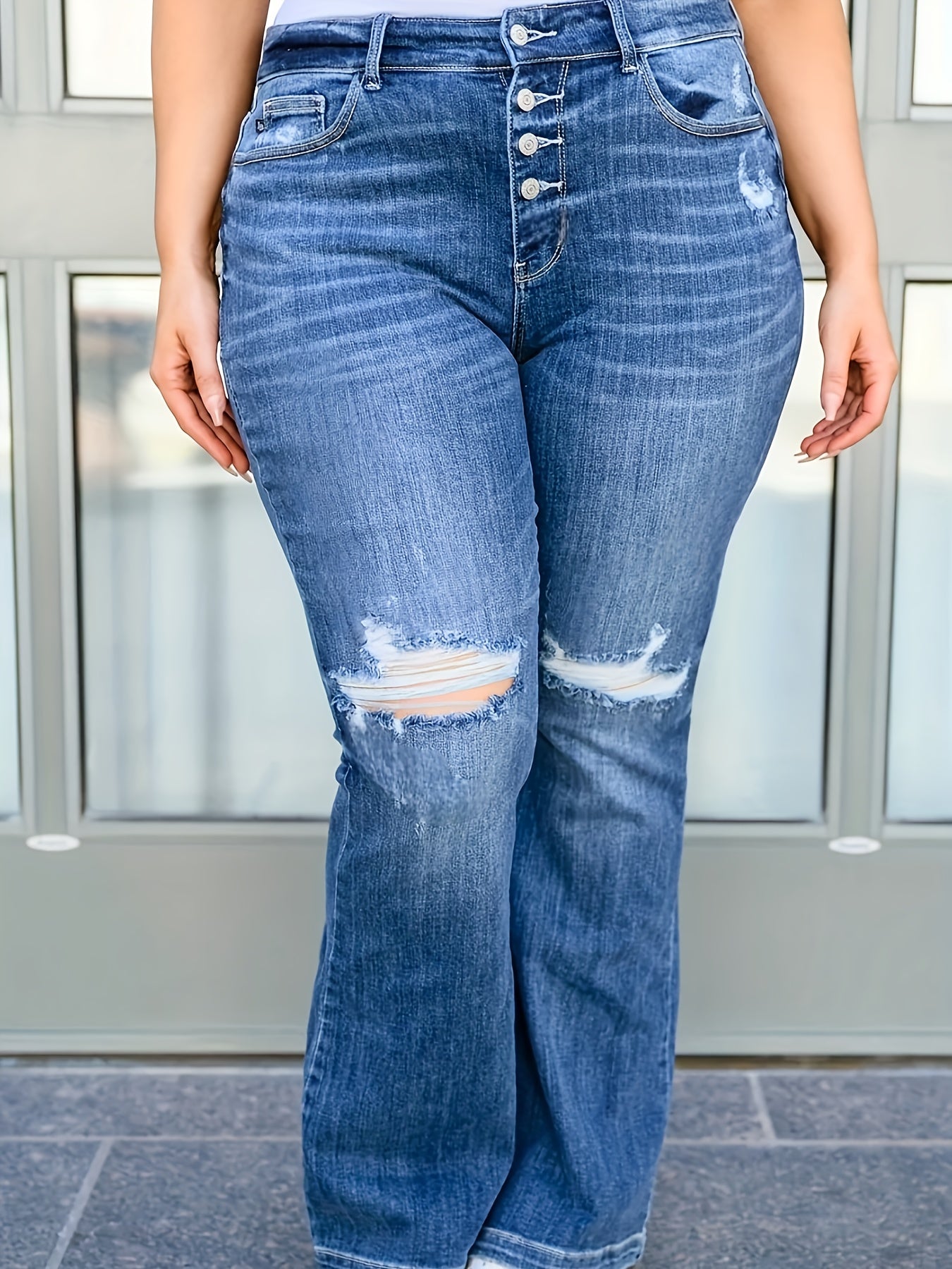 High-Waisted Ripped Bell-Bottom Jeans