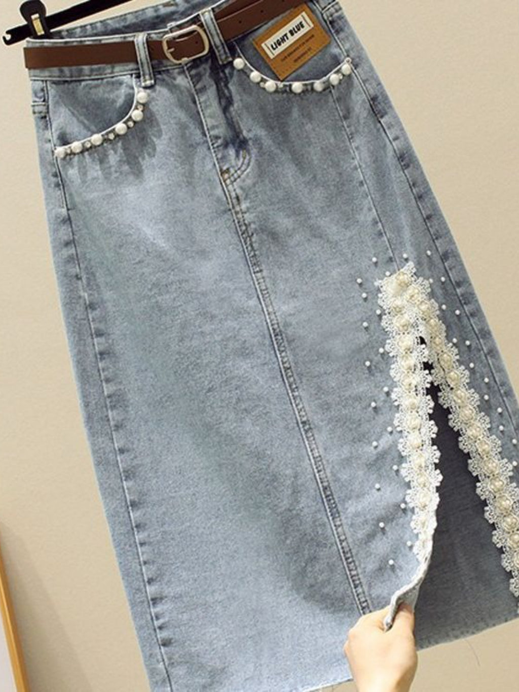 High-Waisted Slim-Fit Denim Skirt with Pearl-Trimmed Slit & Fringe Hem