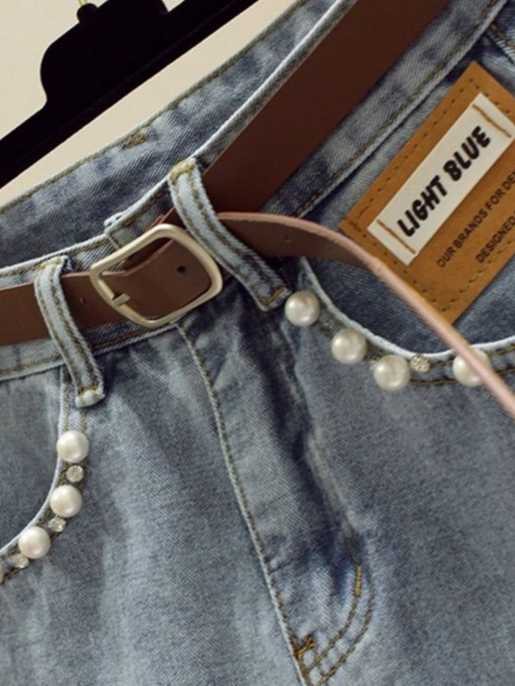 High-Waisted Slim-Fit Denim Skirt with Pearl-Trimmed Slit & Fringe Hem